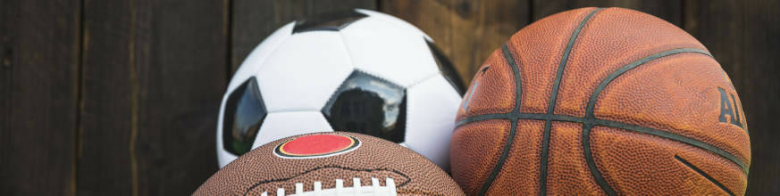 an image of assorted sports balls like foodball and basketball