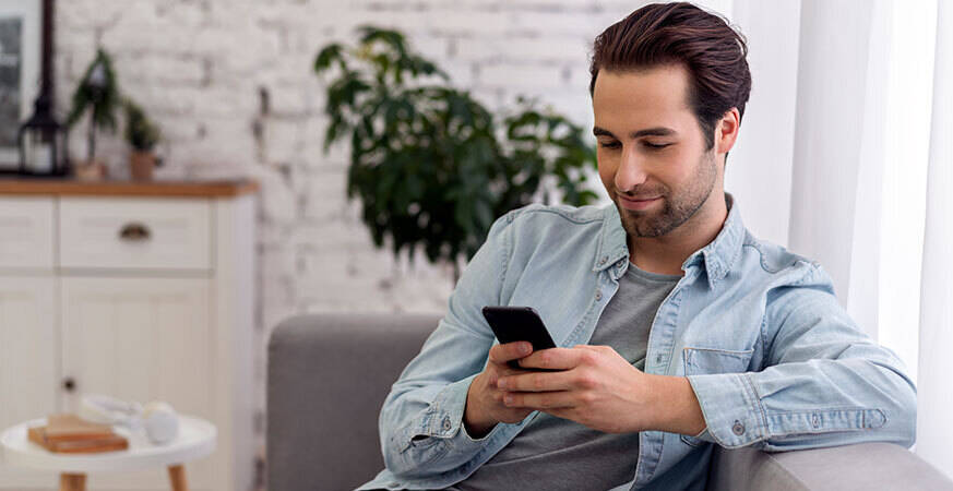 man holding his phone