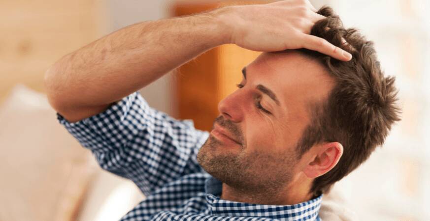 happy man touching hair